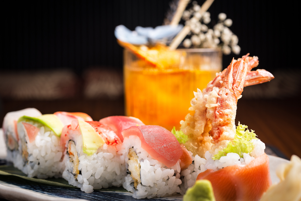 sushi plate and cocktail in restaurant